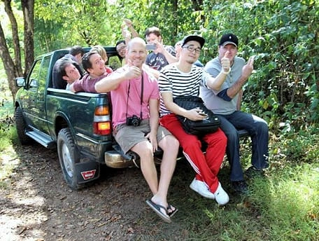 CMLocals Chiang Mai Locals getting around happy group of travelers in songthaew pickup truck
